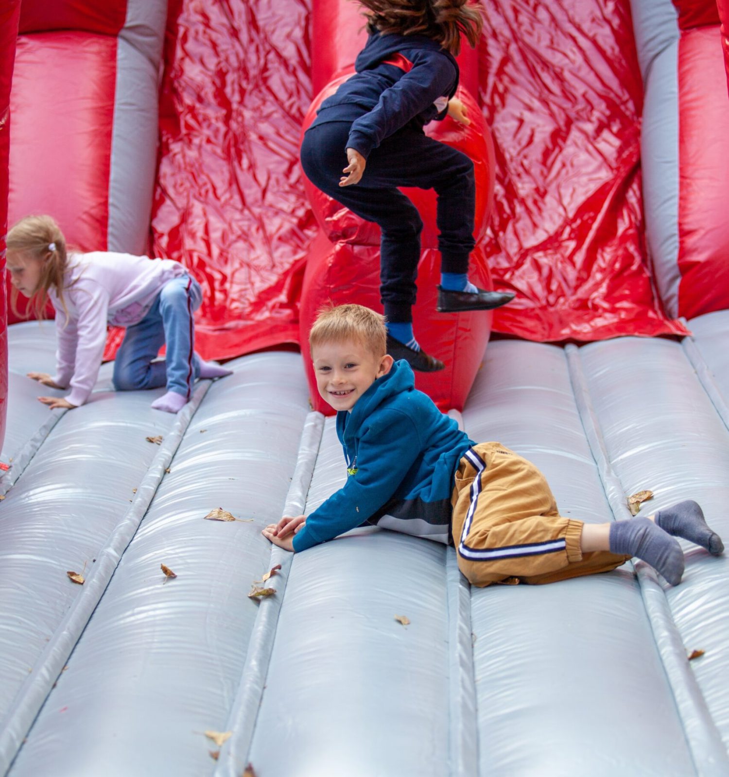 children-jump-on-an-inflatable-rubber-trampoline-i-2024-12-04-21-22-58-utc